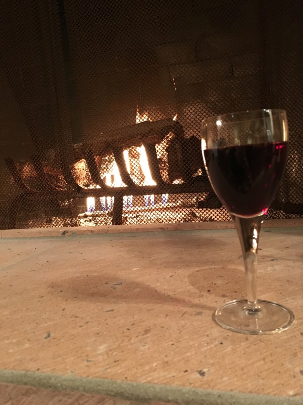 Wine by the fireplace